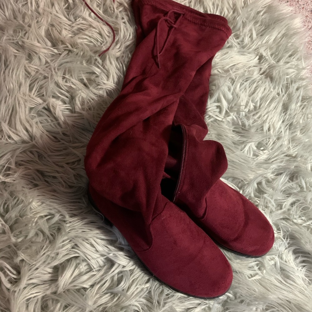 Over the knee maroon boots